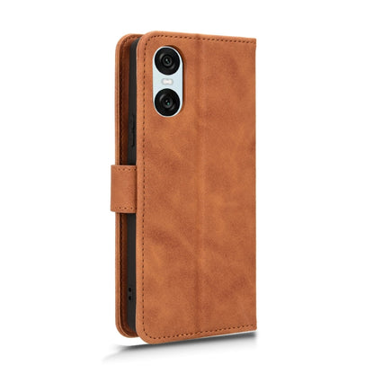 For Sony Xperia 10 VI 2024 Skin Feel Magnetic Flip Leather Phone Case(Brown) - Sony Cases by buy2fix | Online Shopping UK | buy2fix